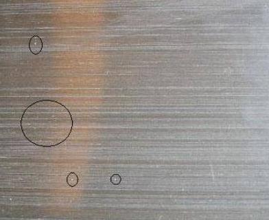 Aluminum surface burrs